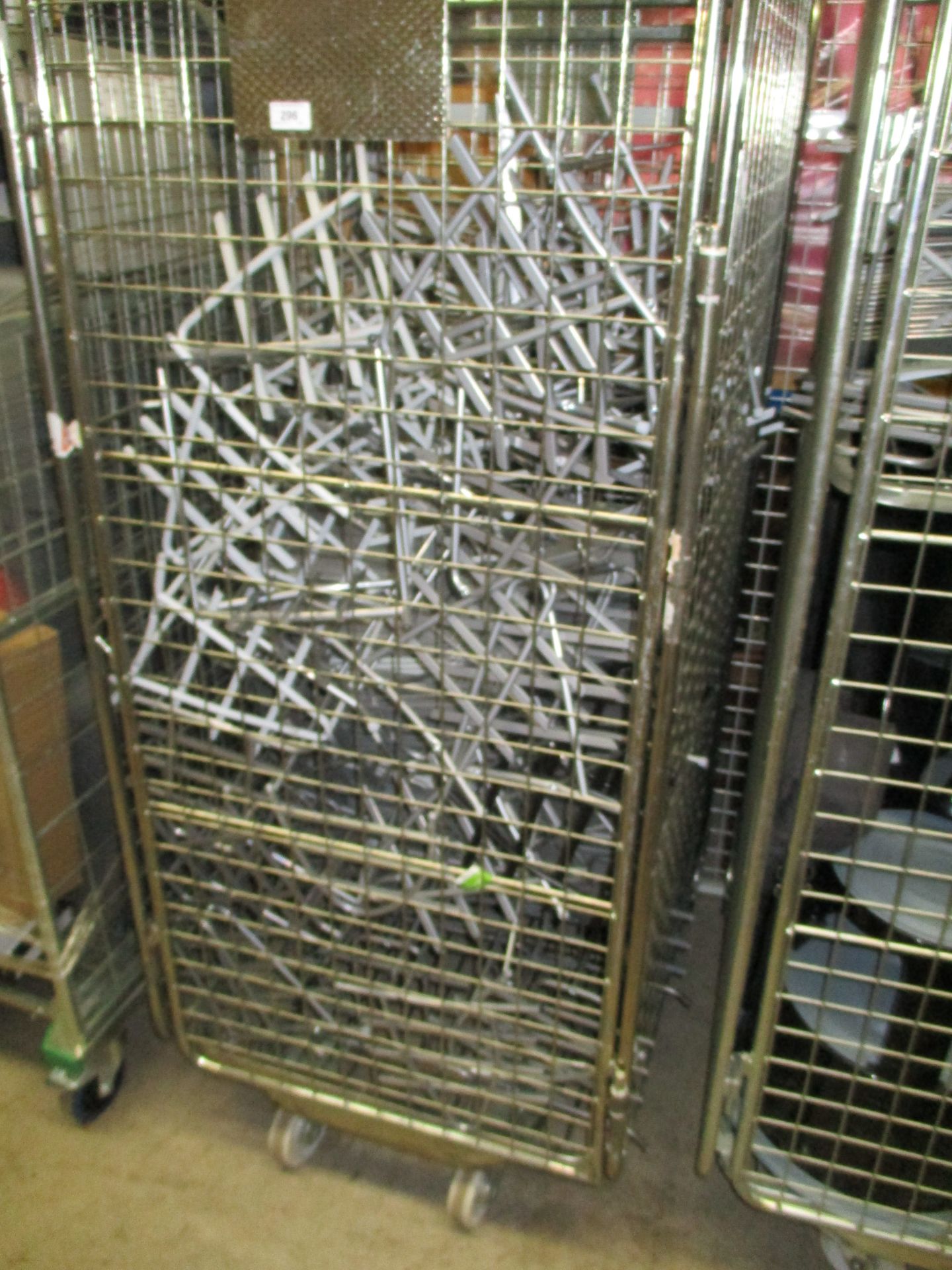 Contents to cage - large quantity of grey metal filing trays (please note - cage is not included