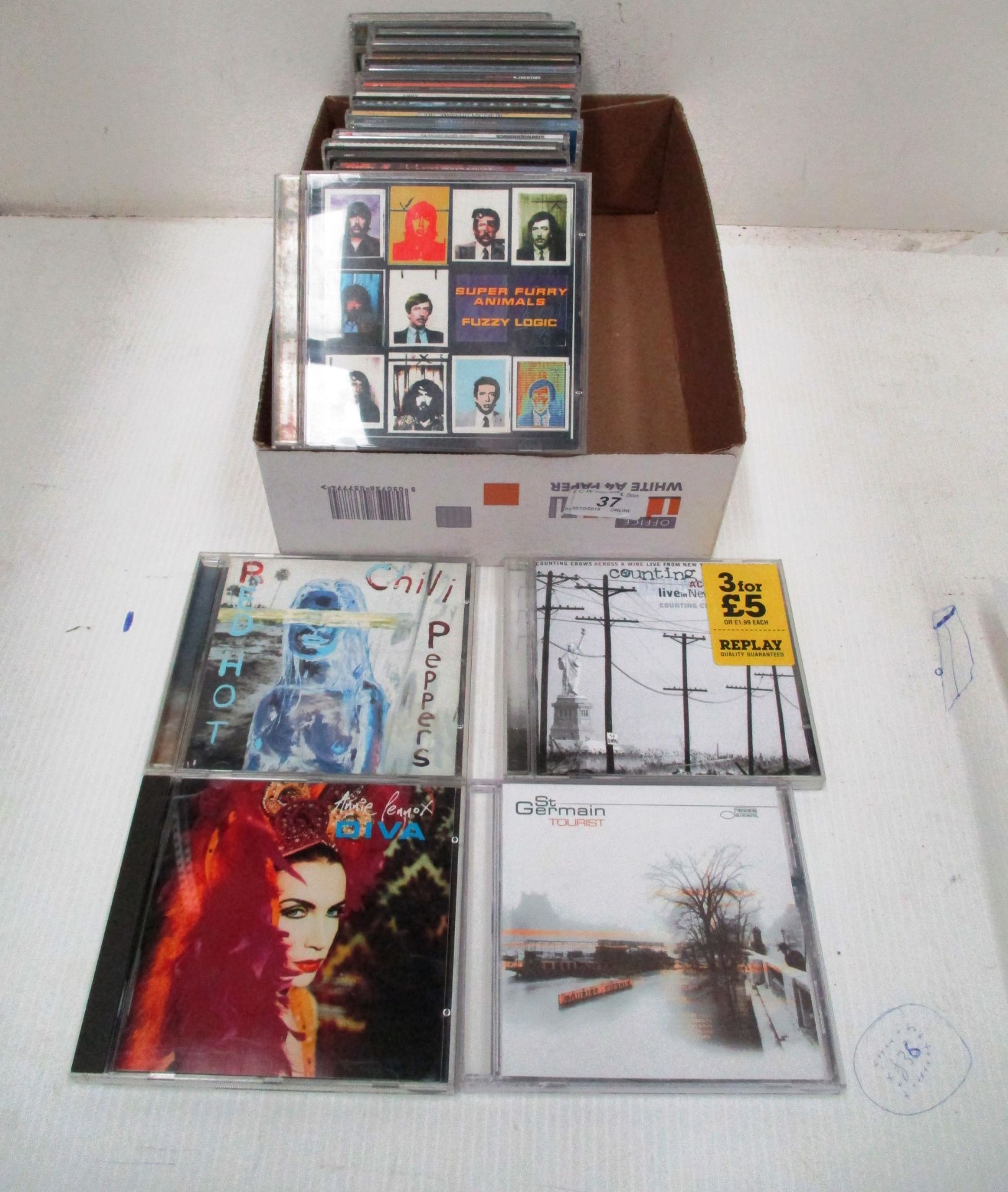 Approximately 30 x rock/pop CDs including Red Hot Chilli Peppers, Annie Lennox,