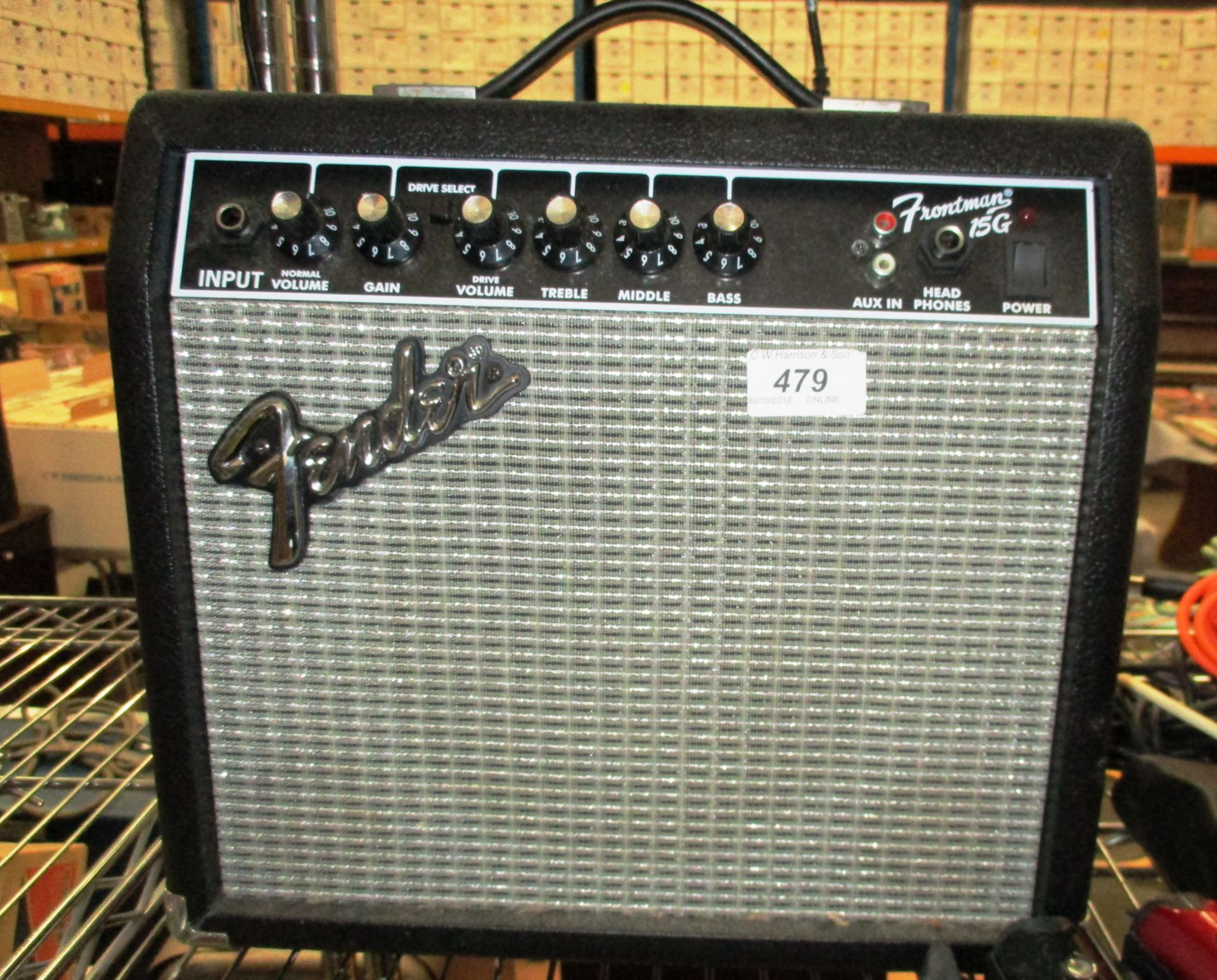 A Fender Frontman 156 amplifier complete with a quantity of jack plugs