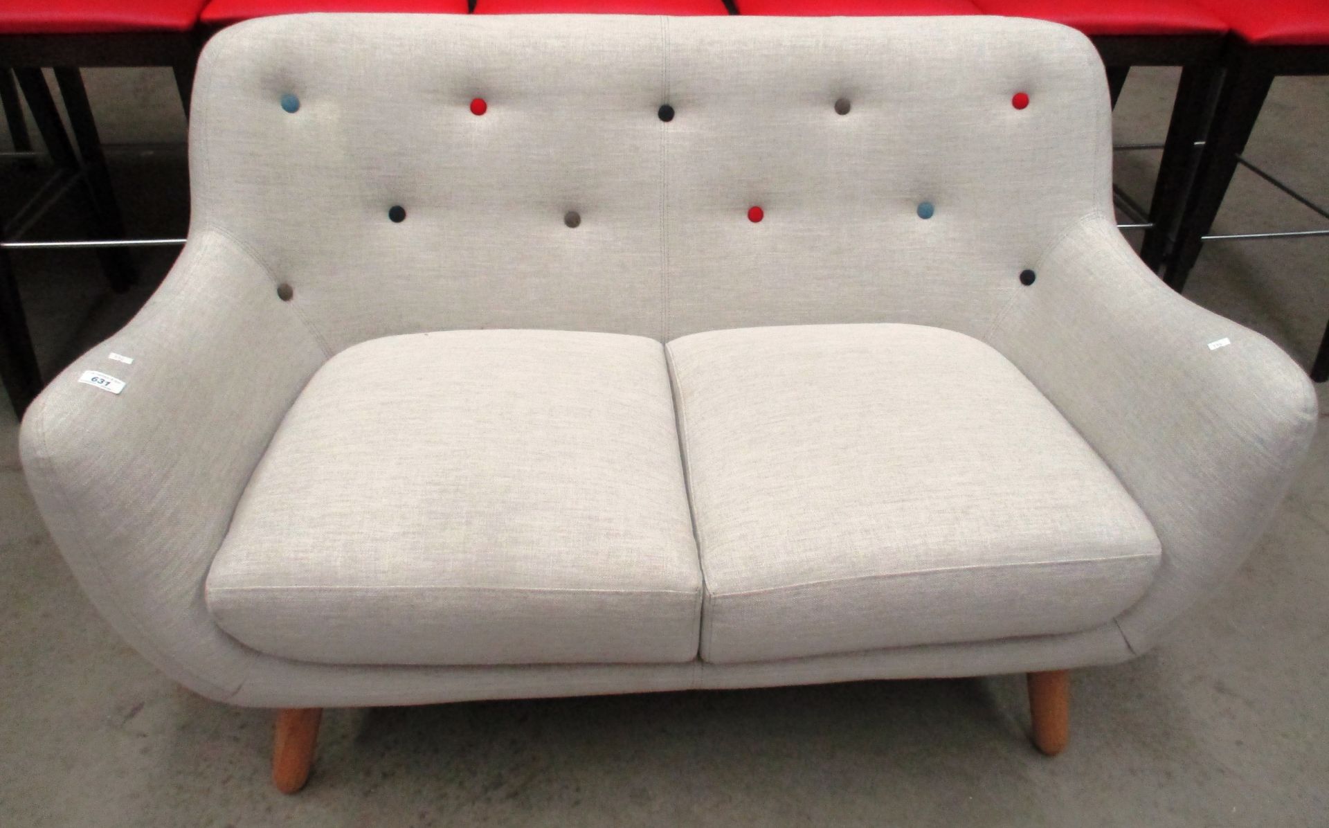 A contemporary light grey two seater settee