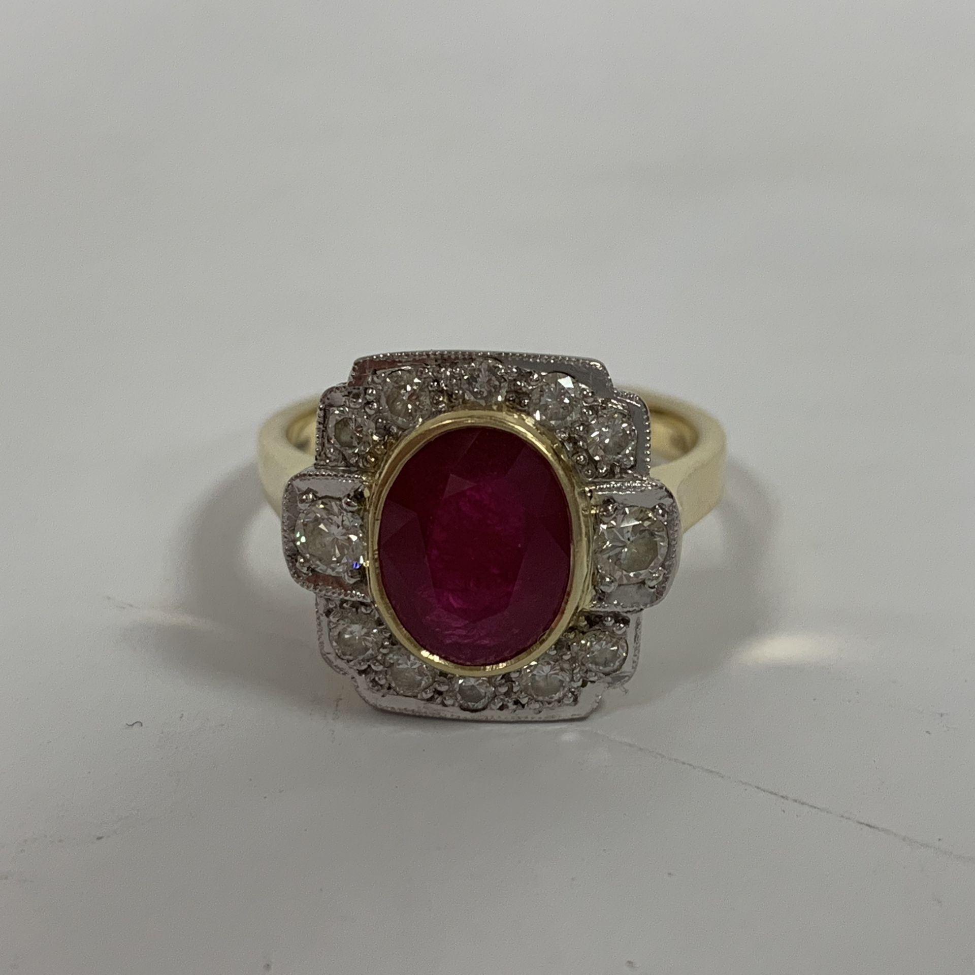 An Art Deco style ruby and diamond ring complete with valuation certificate which details the ring - Image 2 of 8