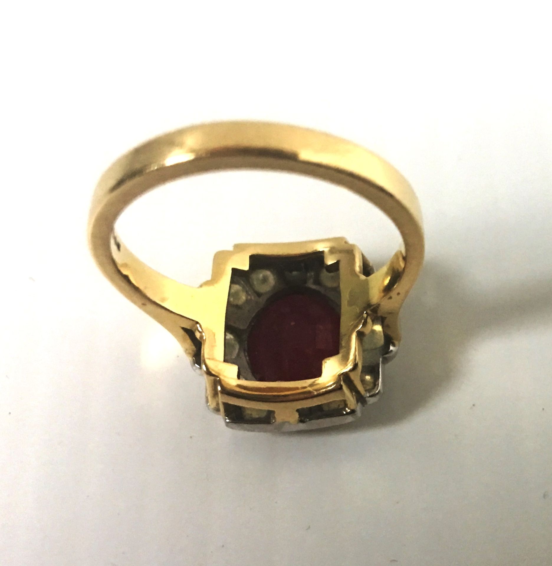 An Art Deco style ruby and diamond ring complete with valuation certificate which details the ring - Image 7 of 8
