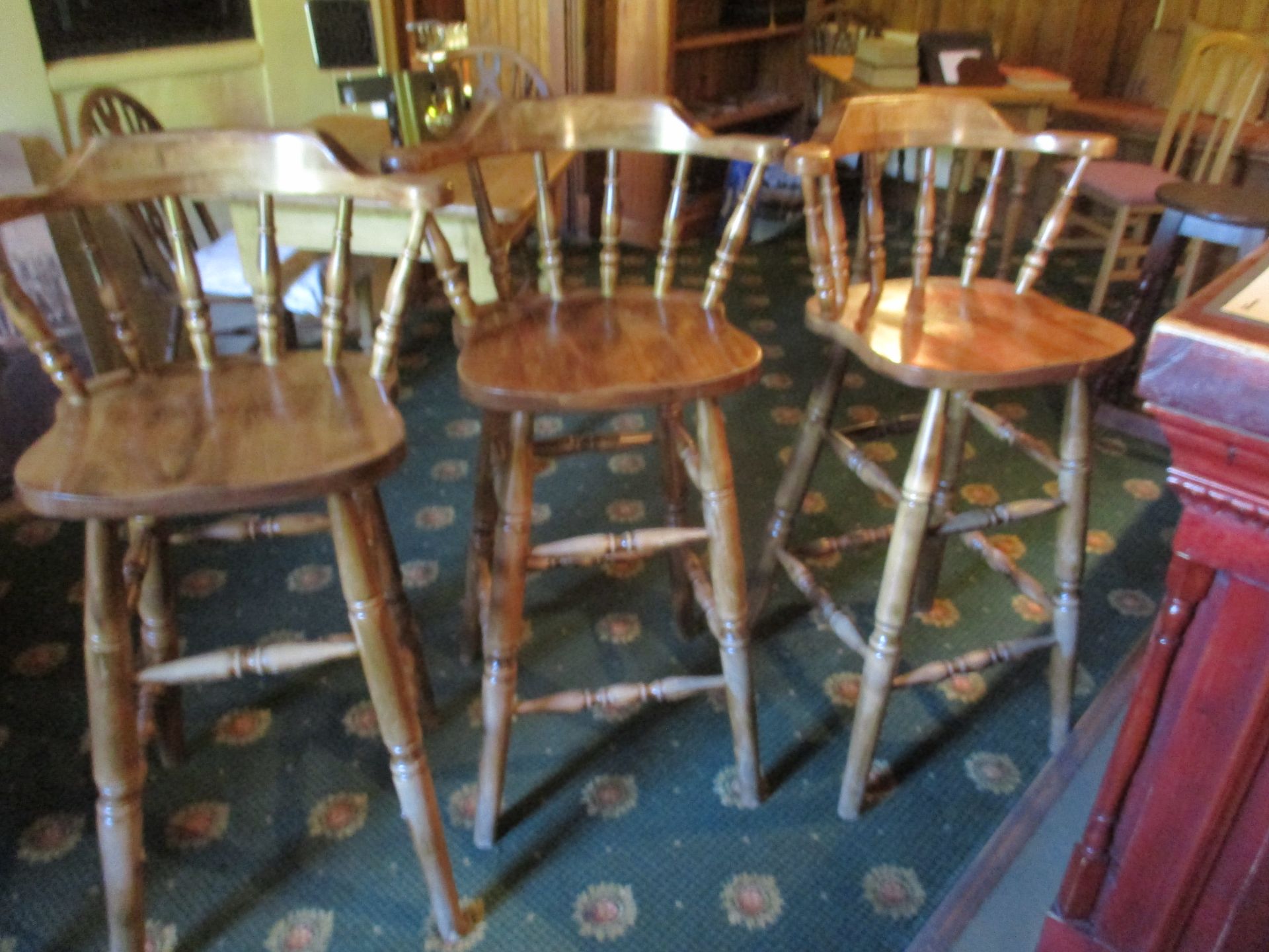 Three light oak bar chairs