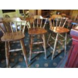 Three light oak bar chairs