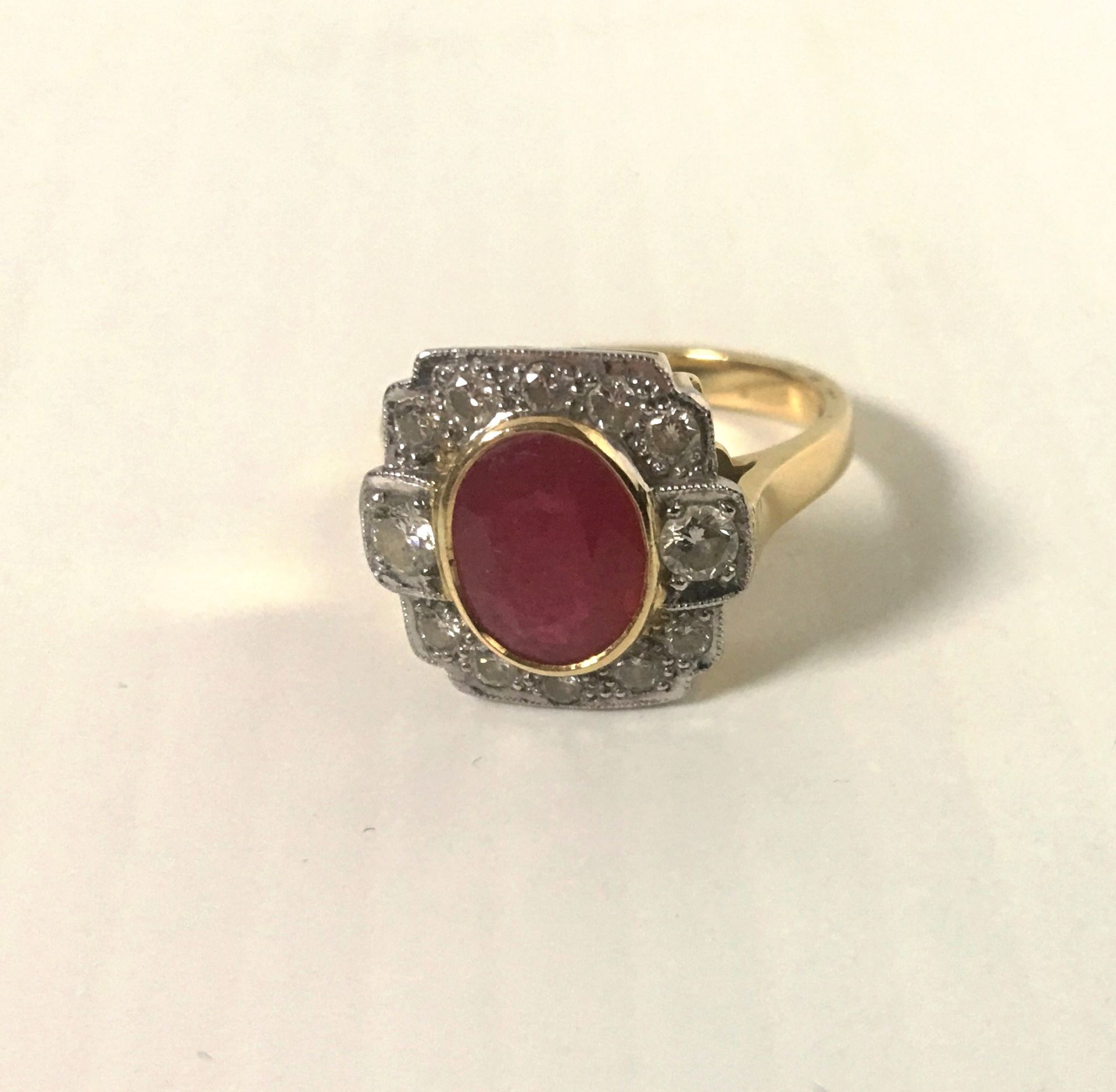 An Art Deco style ruby and diamond ring complete with valuation certificate which details the ring - Image 4 of 8