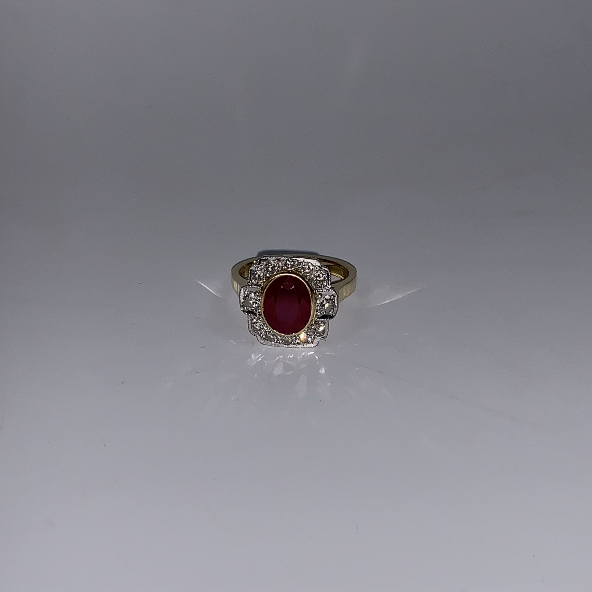 An Art Deco style ruby and diamond ring complete with valuation certificate which details the ring - Image 3 of 8