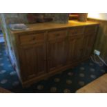 Pine sideboard 180cm x 53cm x 94cm [excludes contents] fitted four drawers and two double cupboards