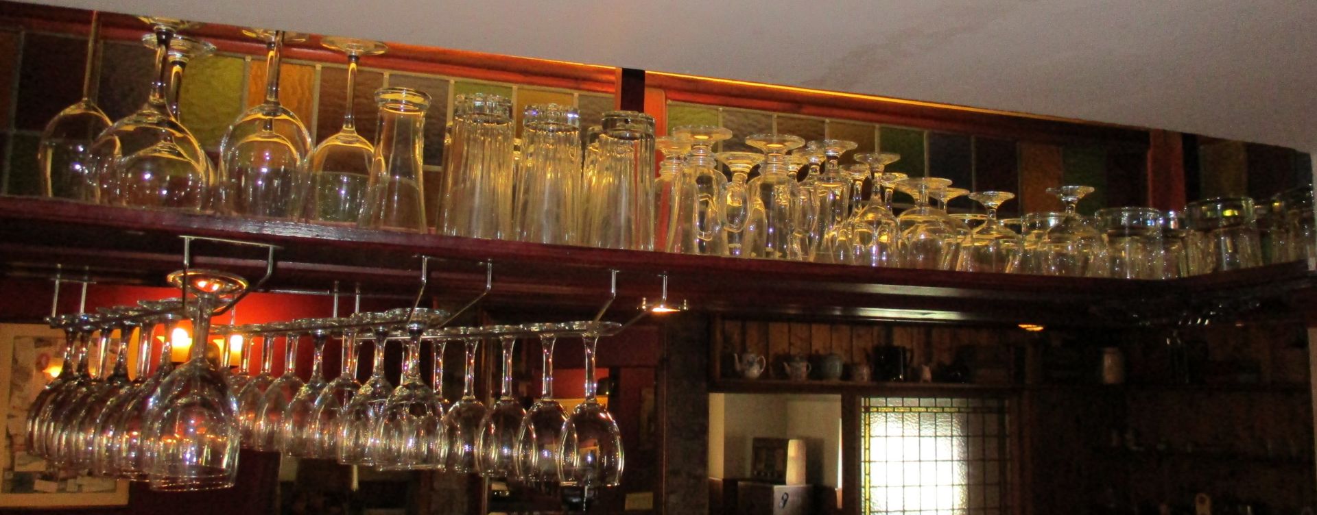 Contents to other part of bar shelf - approximately 70 x wine, brandy, whisky glasses,