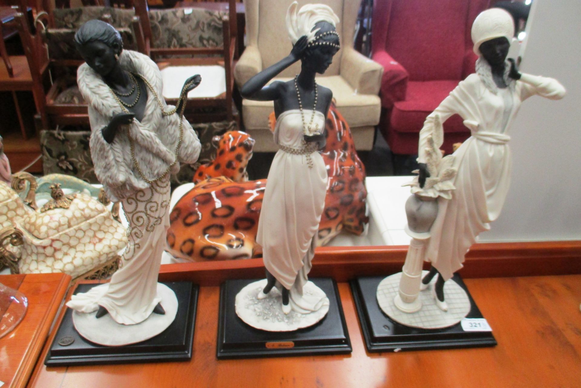 Three Dear (A Belcari) composition statues of 1920s ladies each approx 42cm high