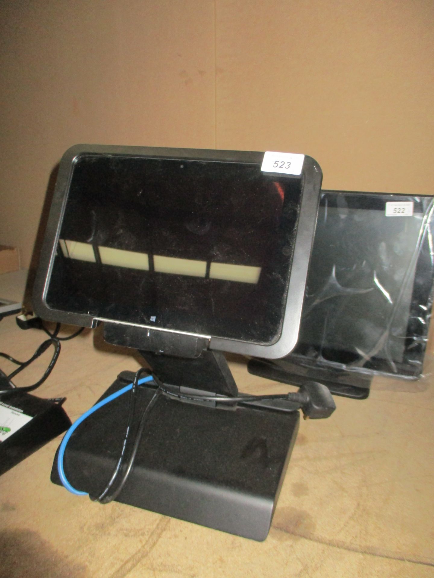 A HP Elitepad 1000 10" tablet complete with adjustable stand - power leads