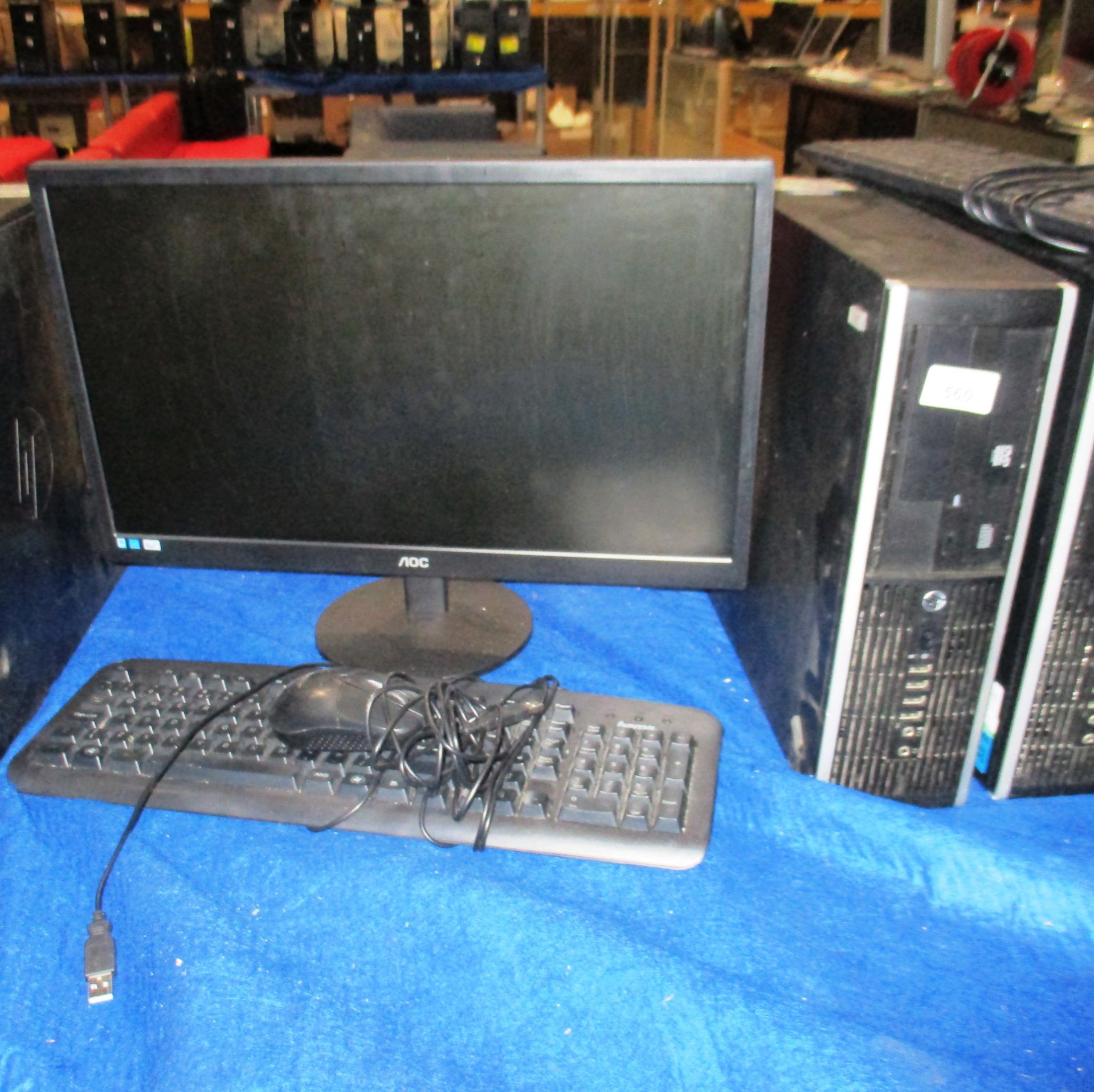 A HP desktop computer complete with power lead, AOC 22" LCD monitor (power lead),