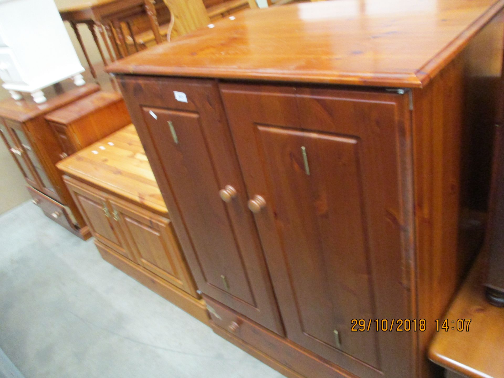 Pine two door single drawer TV/entertainment cabinet and a pine low two door cabinet (2)