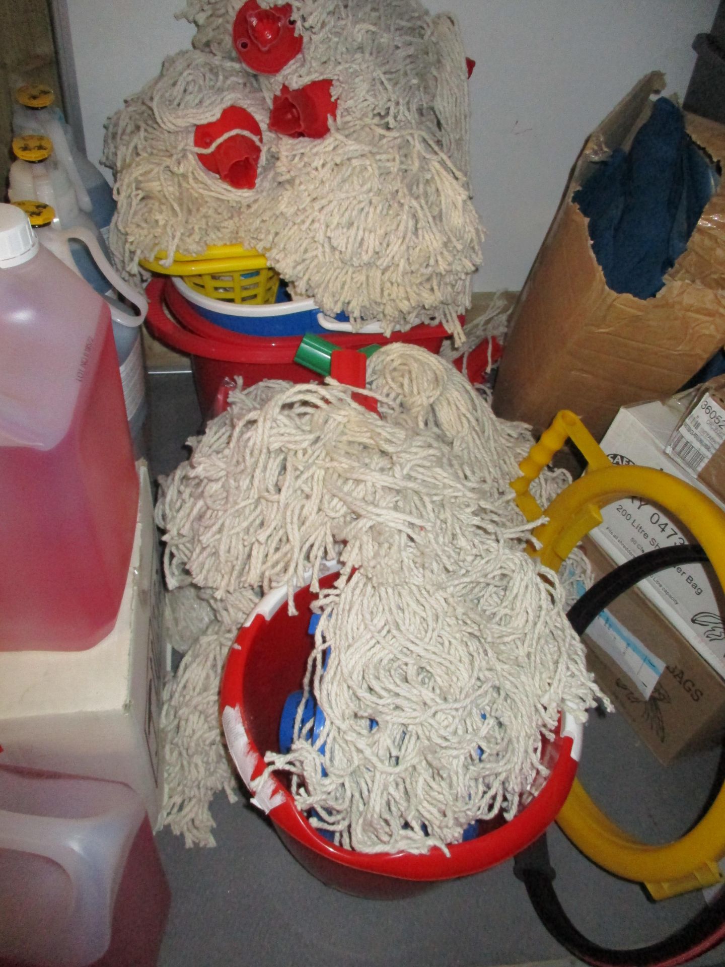 Assorted mop buckets and 27 mop heads