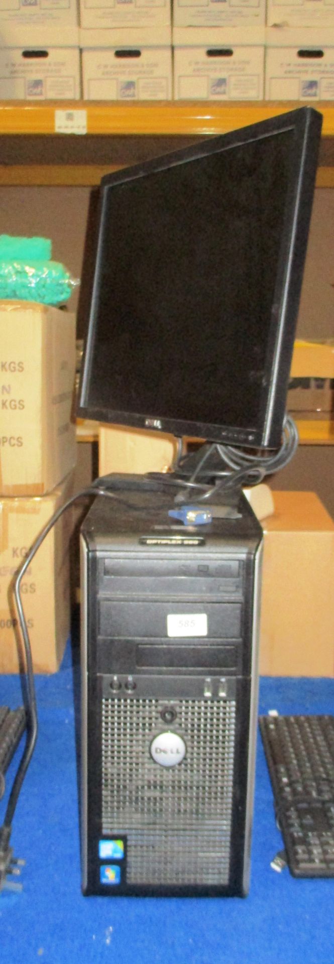 A Dell Optiplex 380 tower computer - power lead complete with a Dell LCD monitor, power lead,