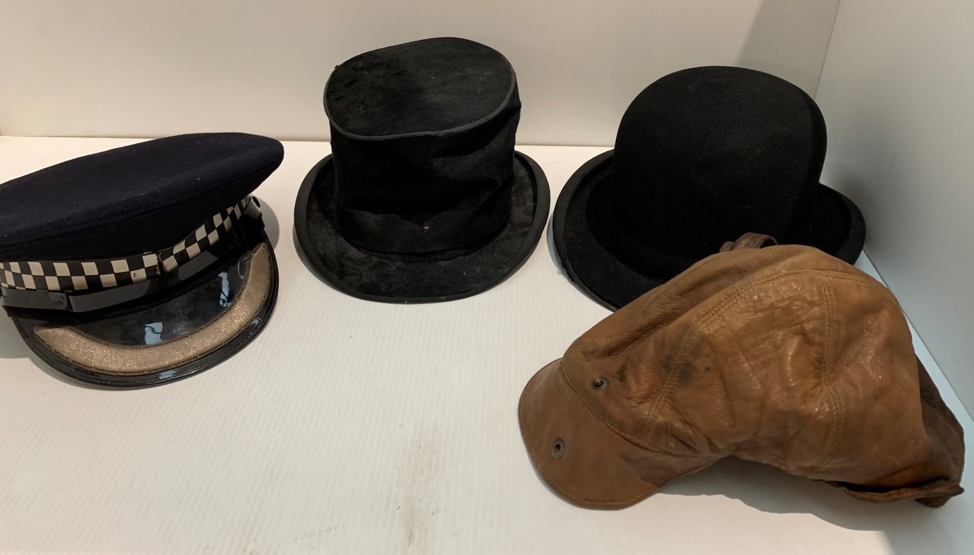 Leather flying cap, policeman's helmet,