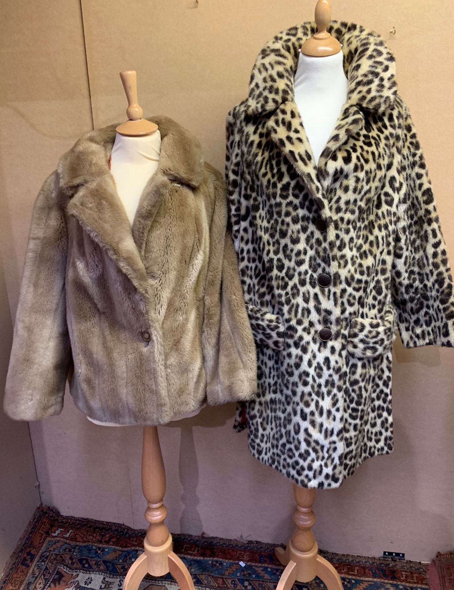 Two faux fur jackets,