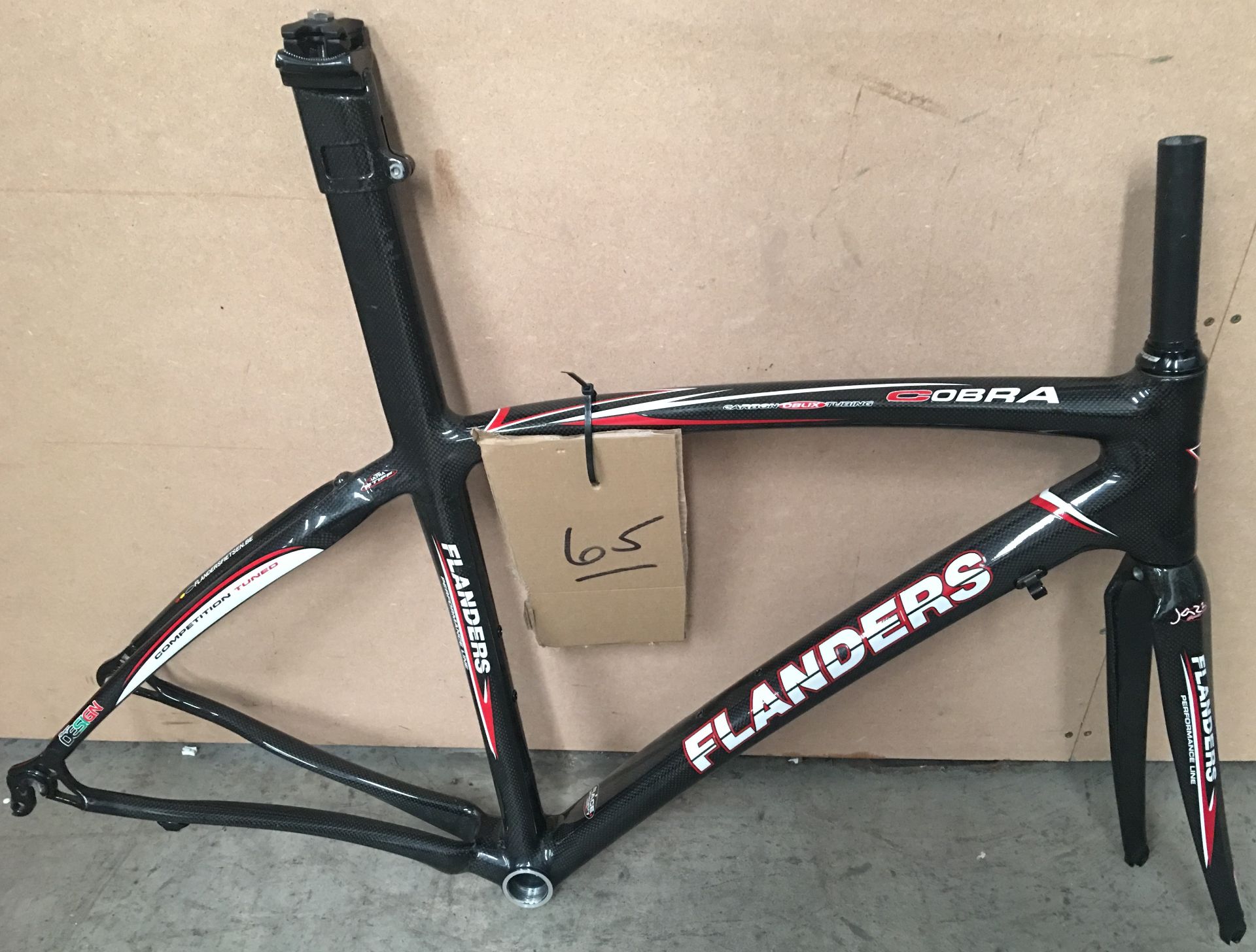 A Flanders Cobra 15" carbon race bike frame with matching front forks