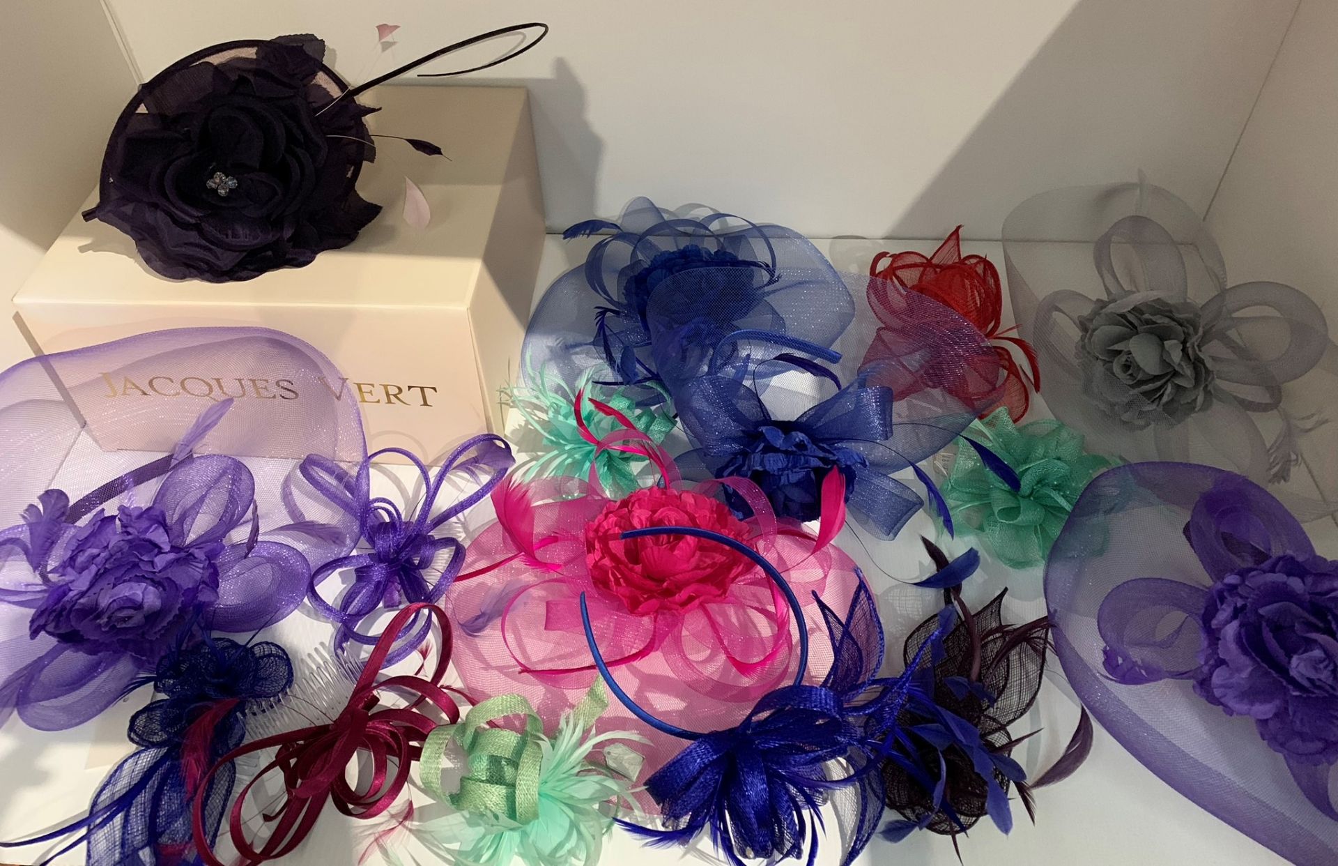 Jacques Vert deep purple fascinator together with 16 further fascinators in assorted colours (17)