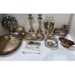 A quantity of silver plated ware - salvers, candlesticks, bowls, etc.