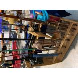 Six assorted fishing rods (please note the stand is property of CWH)