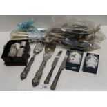 A quantity of assorted plated cutlery 6 boxed napkin rings by Arthur Price and 2 Wedgwood jars with