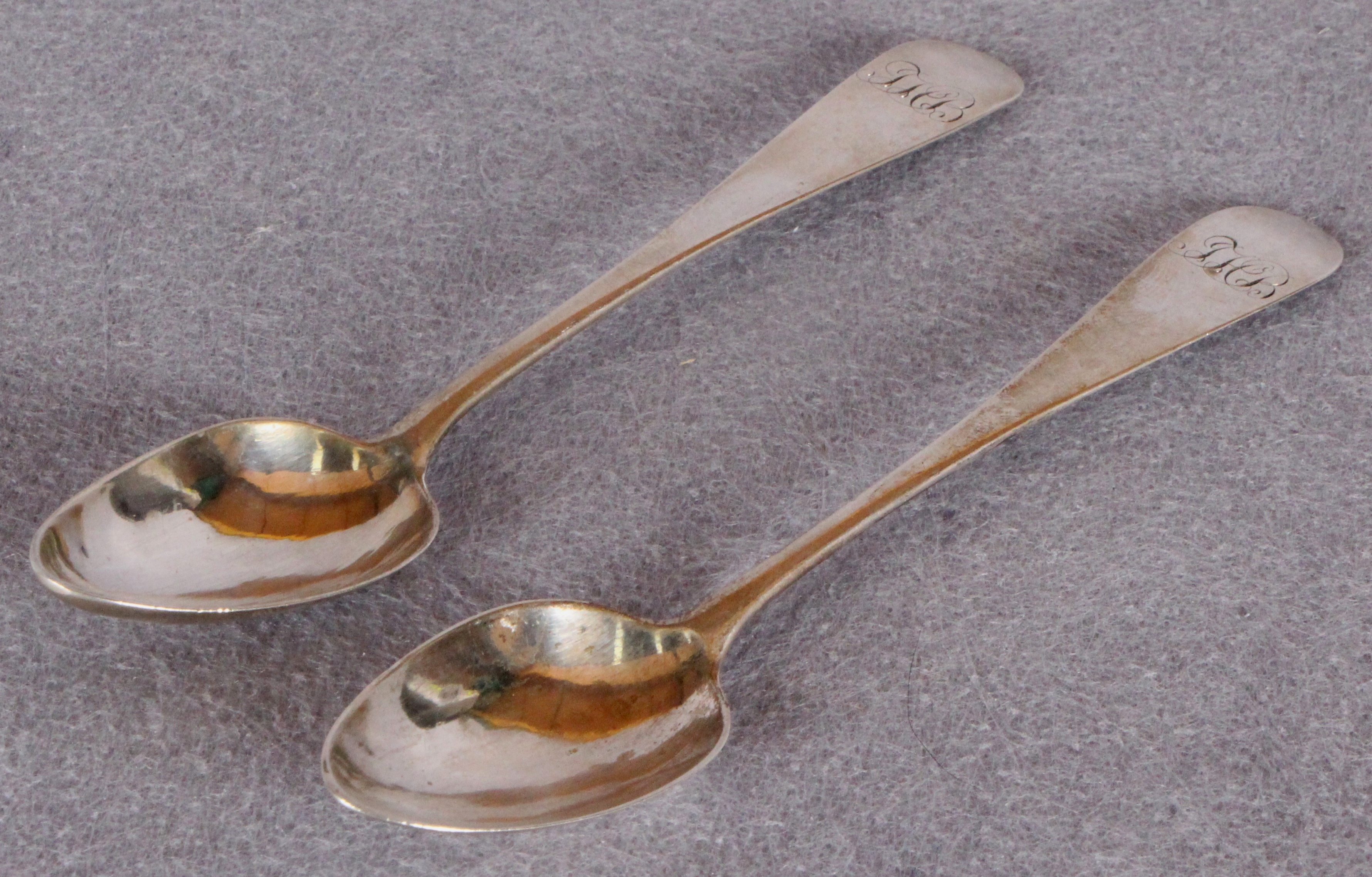 A pair of Scottish Provincial silver teaspoons, engraved cursive initials,