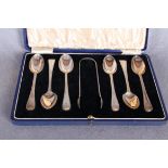 A set of six beaded Old English pattern teaspoons and tongs, engraved initials, London 1872,