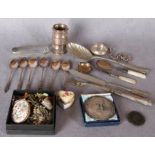 A small quantity of costume jewellery, silver wares comprising two pairs of napkin rings,
