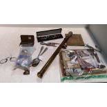 Contents to box - The Florists Friend brass spraying syringe, pair of pince-nez,