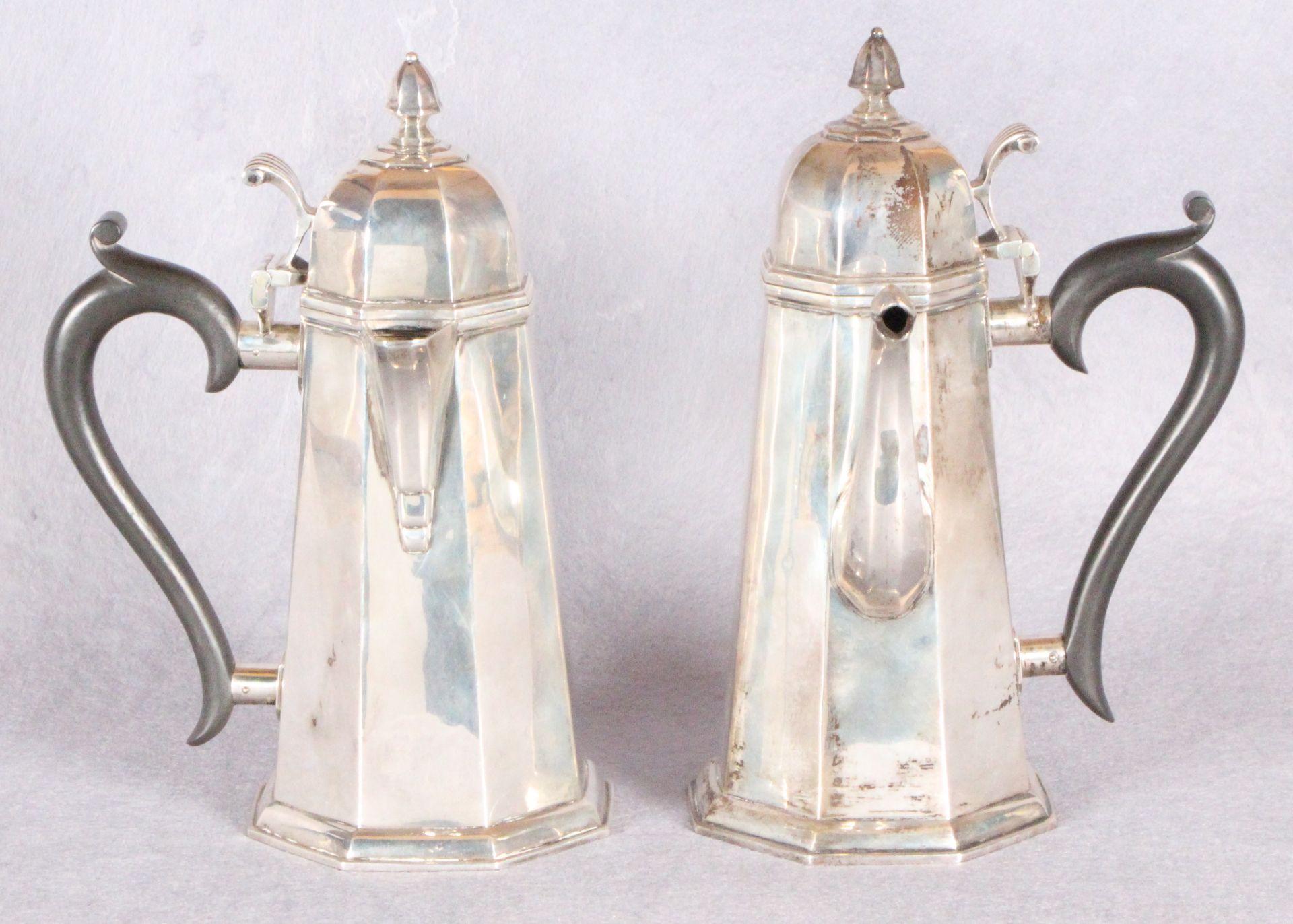 An octagonal coffee pot and matching hot milk jug,