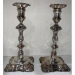 A pair of Sheffield silver plate candlesticks,