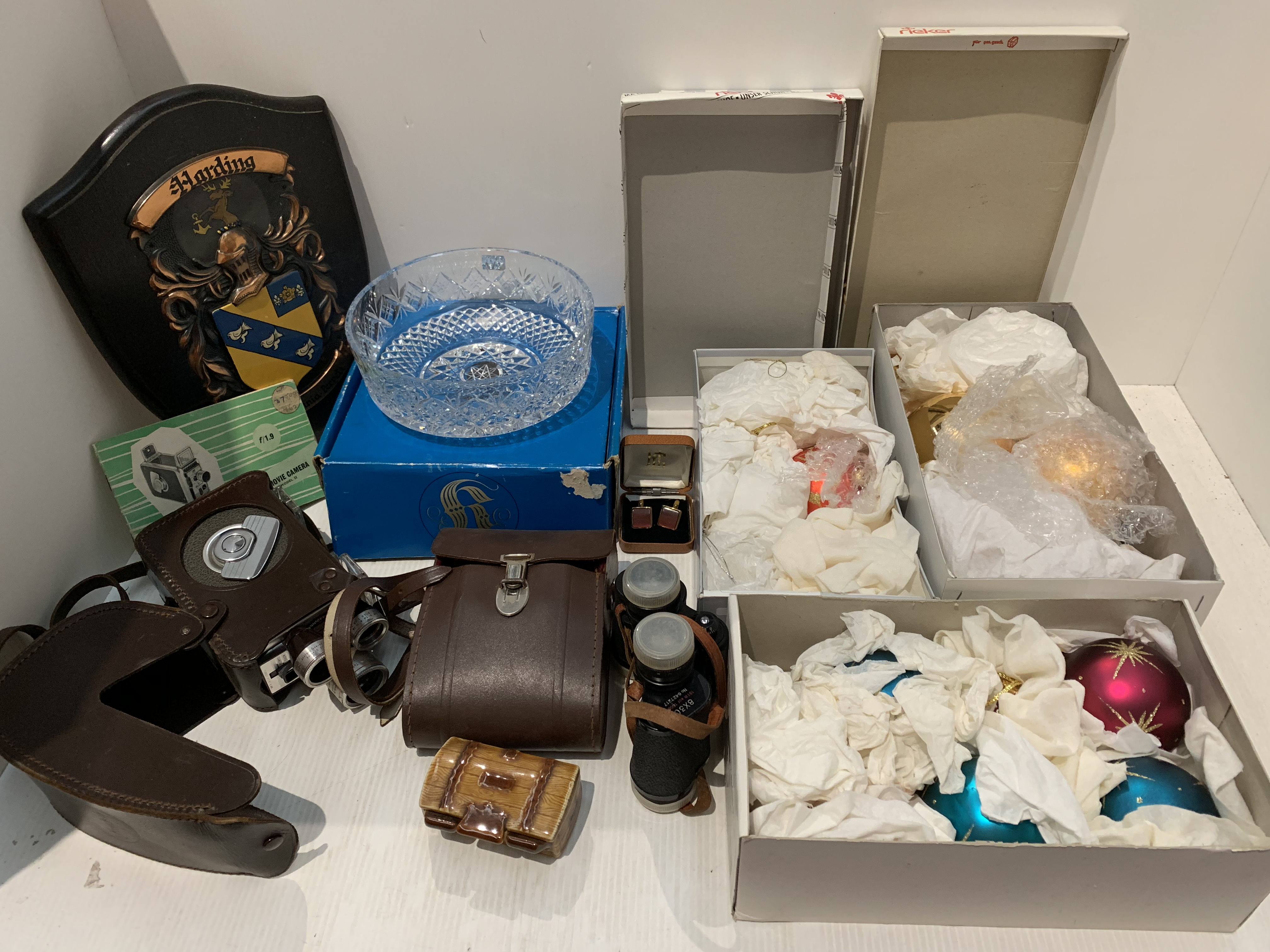 Vintage Christmas decorations, Kodak Brownie 8mm movie camera, binoculars, glass bowl, etc.