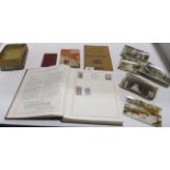 A Strand stamp album containing a small quantity of World stamps, social history postcards,
