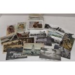 An interesting collection of postcards including real photographic, Bamforth,