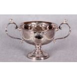 A two-handled pedestal rose bowl, repoussé with swags of ribbon tied floral branches, circular base,