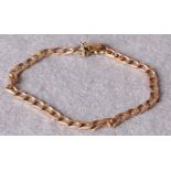 A gold flat link bracelet,