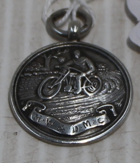 A Silver medal by Thomas Fattorini Birmingham engraved MW and DM 'H.