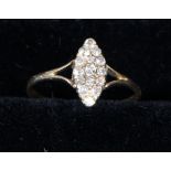 A diamond dress ring of marquise form, claw set in platinum and 18ct gold (approximate weight 2.