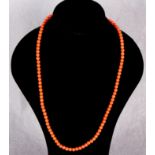 A coral bead necklace, the clasp stamped 750 Further Information Total weight 17.