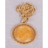 An Edward VII gold sovereign 1904, frame mounted as a pendant, gold trace link neck chain,