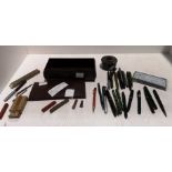 Contents to Bakelite box - large quantity of pens and pencils and a small Bakelite box
