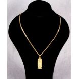 A continental gold hieroglyphics pendant, with flat link neck chain,