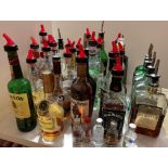 33 x part bottles of spirits - Disaronno, Captain Morgan, Jack Daniels, etc.