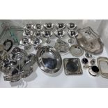 A collection of silver plated ware including coupe dishes, serving dishes, teapot, etc.