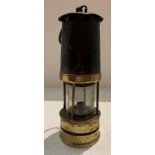 A Hailwood's patent miners lamp with screw off base, stamped 186-99743,