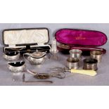 Small group of silver including four napkin rings; Old English pattern Christening spoon, cased,