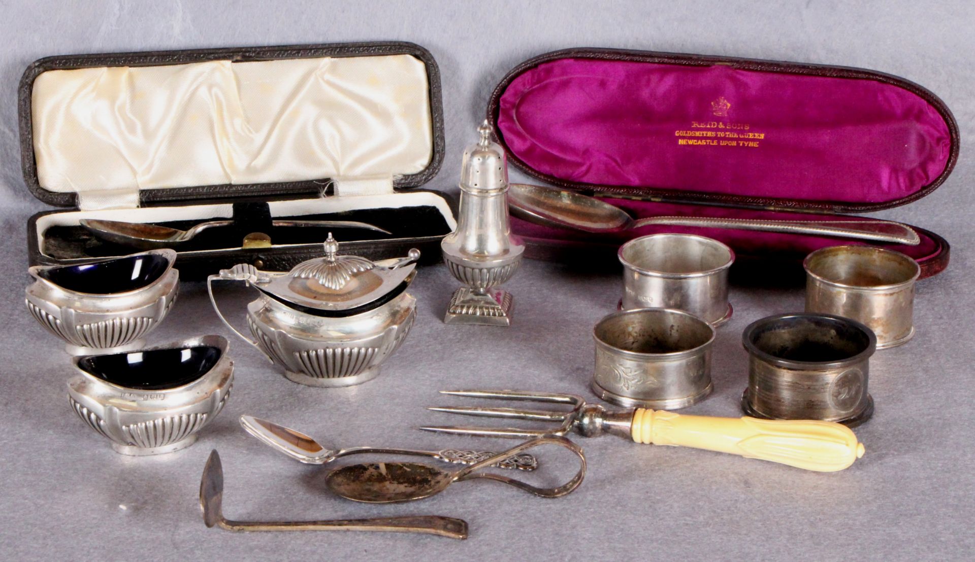 Small group of silver including four napkin rings; Old English pattern Christening spoon, cased,