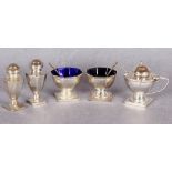 A five piece condiment set of octagonal section on square bases, comprising pair of open salts,