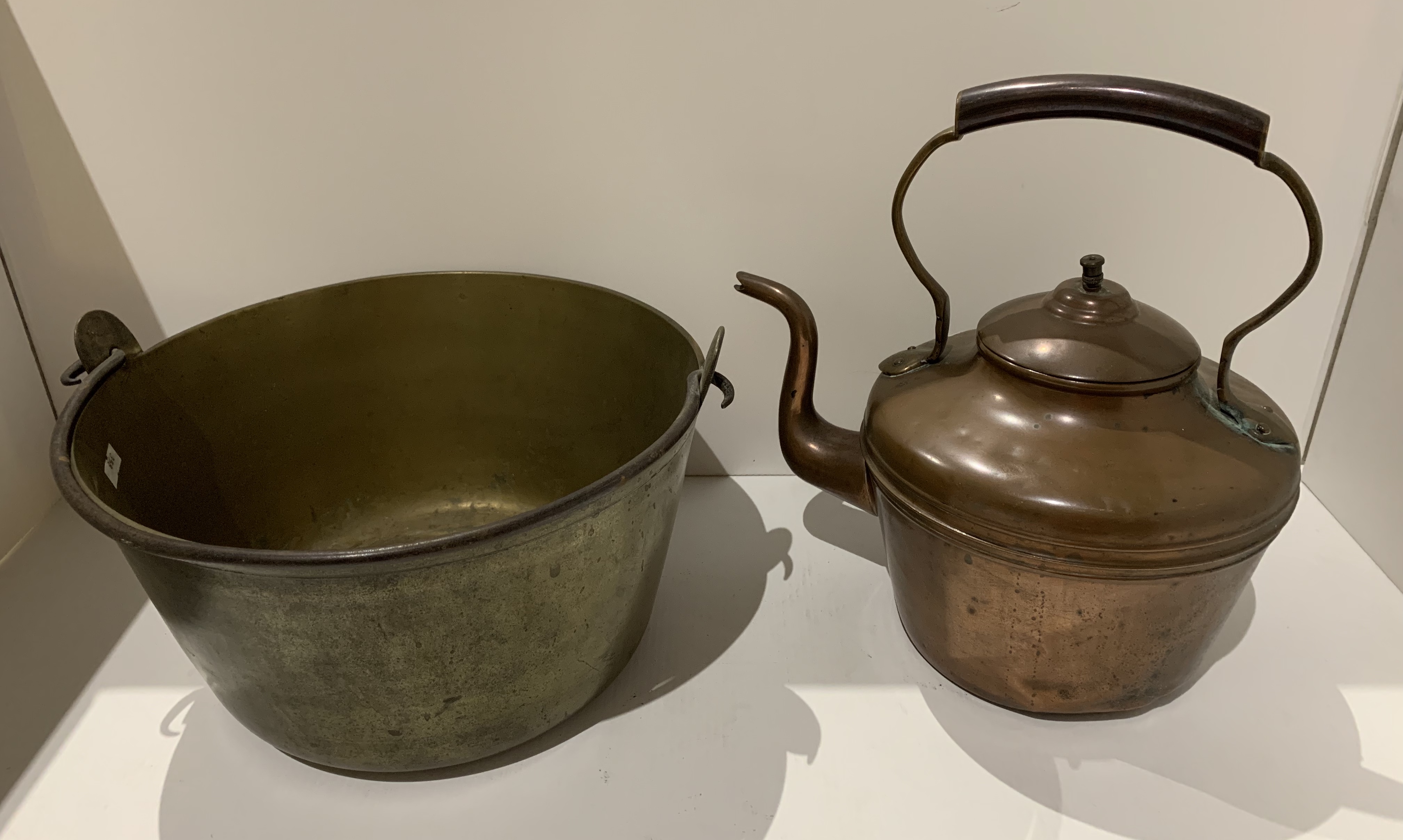 2 items - a brass jam pan and a copper kettle