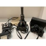 A Vickers Biolux 2 electric microscope initialled C Baker 14292, London, a pair,